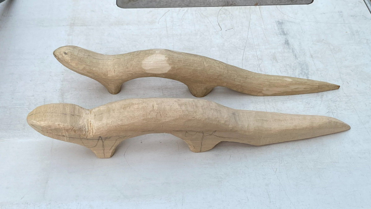 Two Sea Otters carved from basswood. The otter project is perfect as the first woodcarving project due to its gentle curves. The photo was taken for the Tri-Valley Carvers' Newsletter.